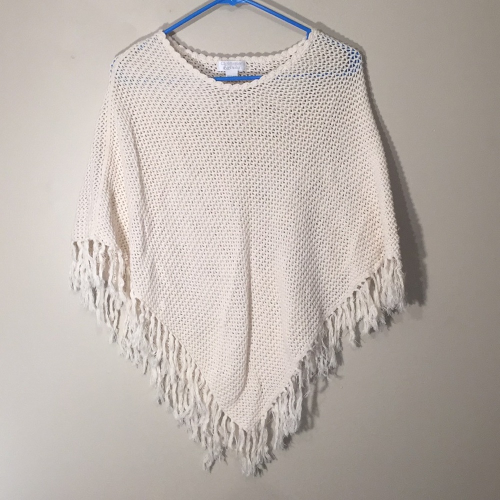 Cream colored fringed Poncho or shawl